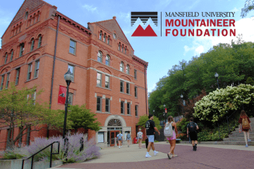 Commonwealth University Mansfield students walk near North Hall. Logo text reads "Mansfield University Mountaineer Foundation"